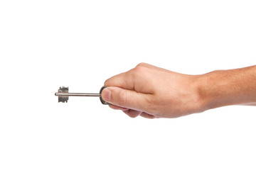 Male hand holding a key to the house