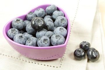 blueberries in heart shaped dish