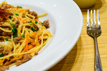 Spagetti with kimchi mixed minced meat beef.