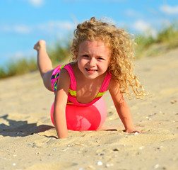 Girl of walking on the beach