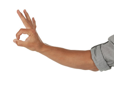 Arm showing an okay sign
