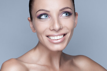 Portrait of happy brunette woman with beautiful eyes - obrazy, fototapety, plakaty