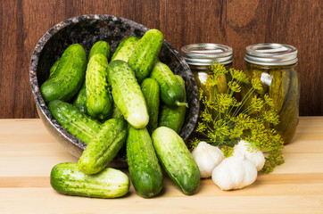 Pickles with jars of pickles