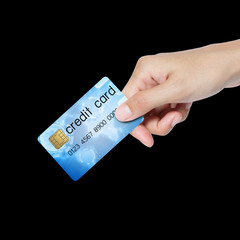 credit card holded by hand over blue background.