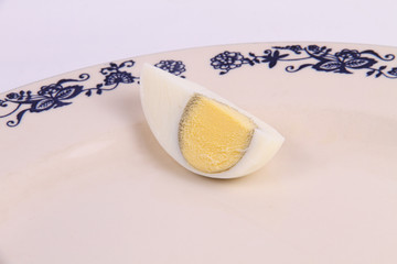 quarter egg on the plate