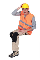 Shocked manual worker