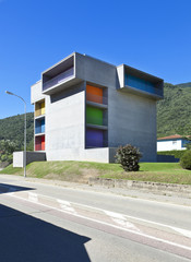 new concrete building, view from the road