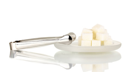 Sugar cubes in saucer isolated on white