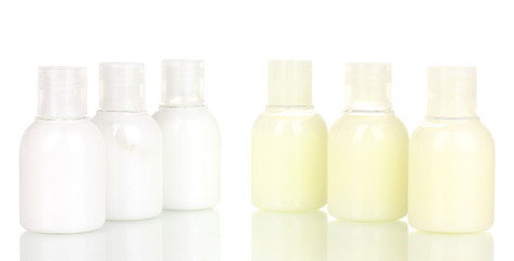 Hotel cosmetic bottles isolated on white