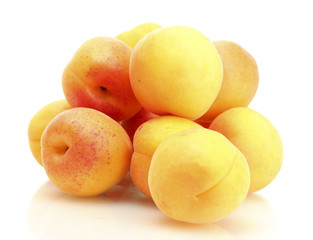 ripe apricots isolated on white