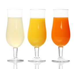 Tropical juices in glasses isolated on white