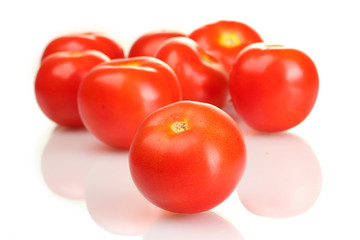 Ripe red tomatoes isolated on white