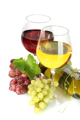 bottle and glasses of wine and ripe grapes isolated on white