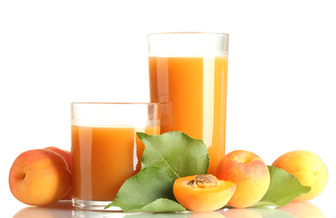 two glasses of apricot juice and apricots with leaves isolated