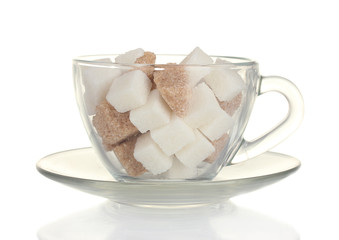 white refined sugar and Lump brown cane sugar cubes in glass