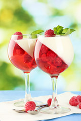 fruit jelly in glasses, berries and mint