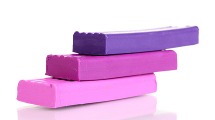 Children bright plasticine isolated on white