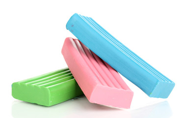 Children bright plasticine isolated on white