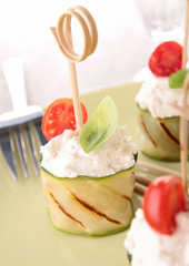 appetizer, grilled zucchini with cheese ,tomato and basil