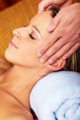 Young woman in Spa massage salon.