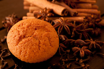 Muffin close up with spice background