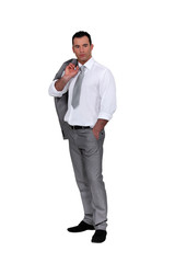 Businessman with his jacket over his shoulder
