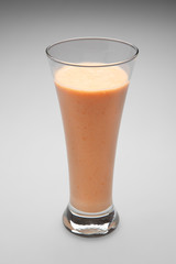 apricot milk smoothie in a glass