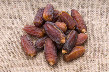 Dried dates on canvas