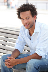 Man sat on park bench