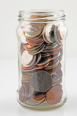saving jar with uk coins