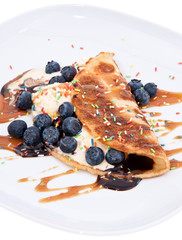 Vanilla Ice Cream decorated with Blueberries