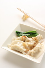 Chinese cuisine, dumpling dim sum Gyoza on dish
