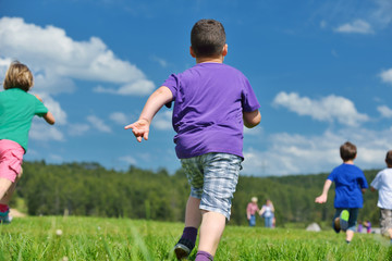 Obraz premium happy kids group have fun in nature
