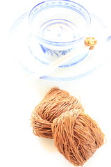 chinese dried noodles with traditonal china bowl on background