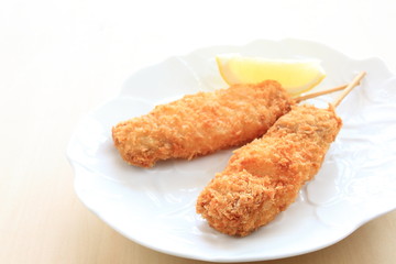 Japanese cuisine, Kushiyaki served with lemon