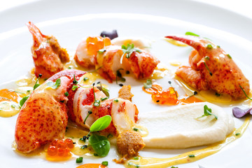 Lobster with caviar and seafood dressings.