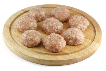 Balls of minced meat isolated on white