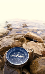 compass on the shore - 43488766