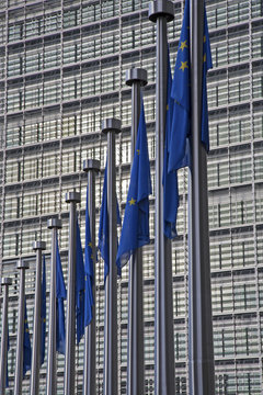 Brussels - Facade of European commission building and EU flags