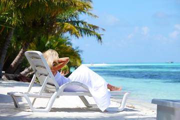 tropical woman on lounge