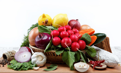 Healthy food. Fresh vegetables and fruits on a wooden board.