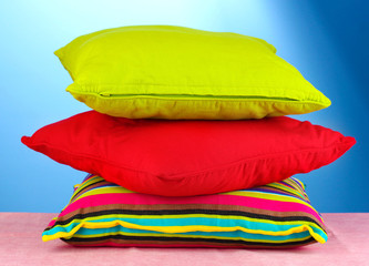 pillows on blue background