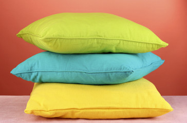pillows on red background