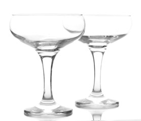 empty glasses of champagne isolated on a white