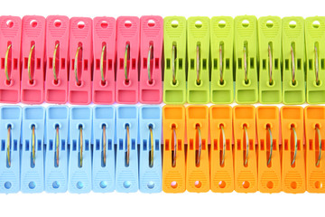 Direct pegs row from upper on white background.