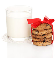 Glass of milk and cookies isolated on white