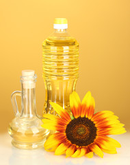 sunflower oil in a plastic bottle and small decanter