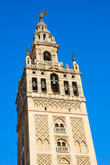Fototapeta na wymiar Bell tower of Cathedral church, Seville, Spain