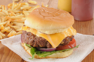 Thick cheeseburger with fries