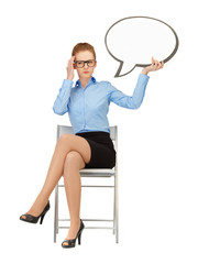 pensive businesswoman with blank text bubble
